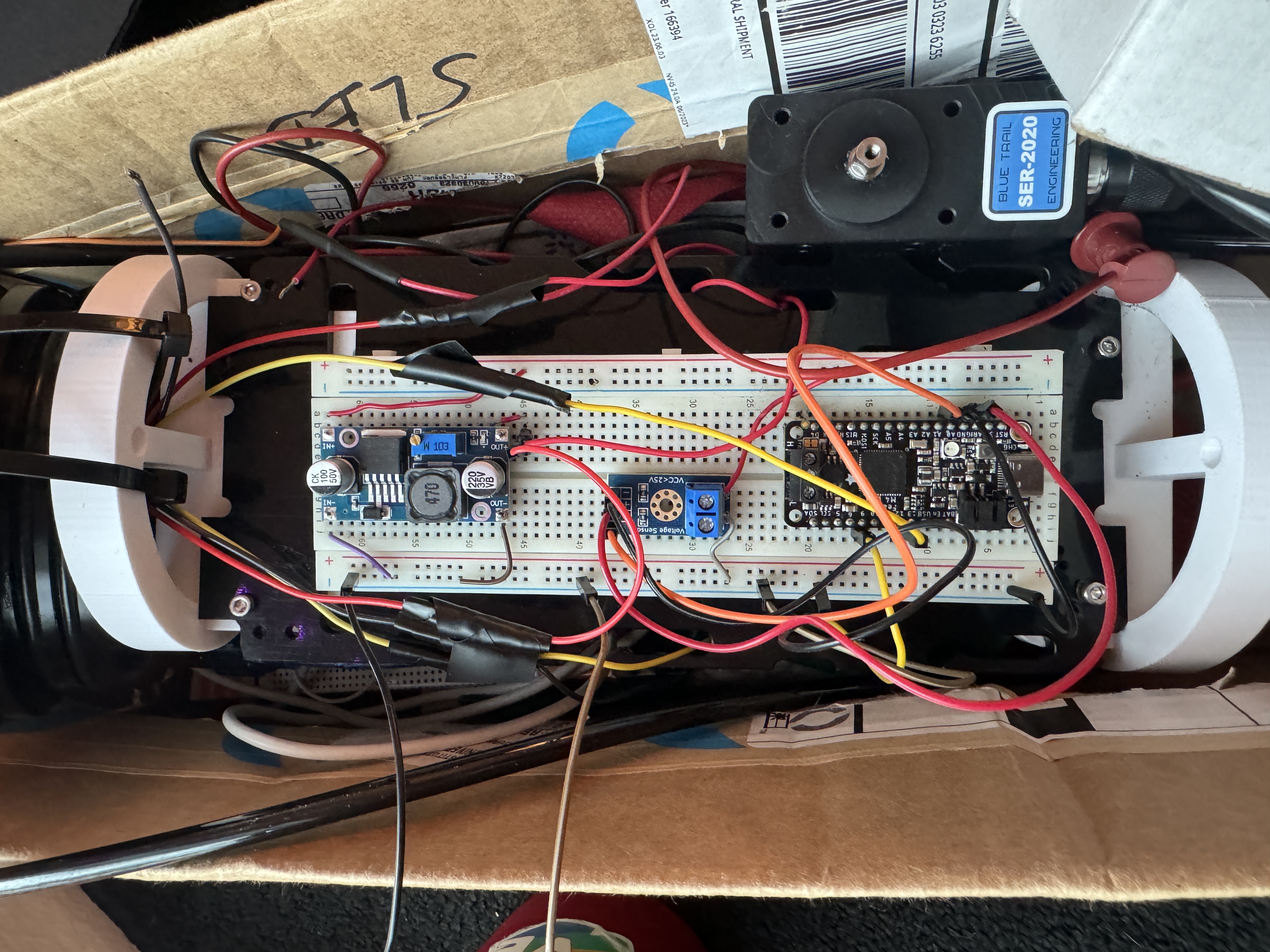 Prototype 3 electronics — breadboard, servo, microcontroller inside hull